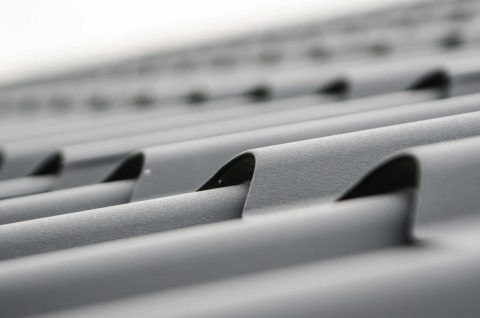 Closeup of a metal roof - find metal roof installers near me.
