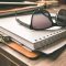 Clipboard and notepad for selecting a roof contractor